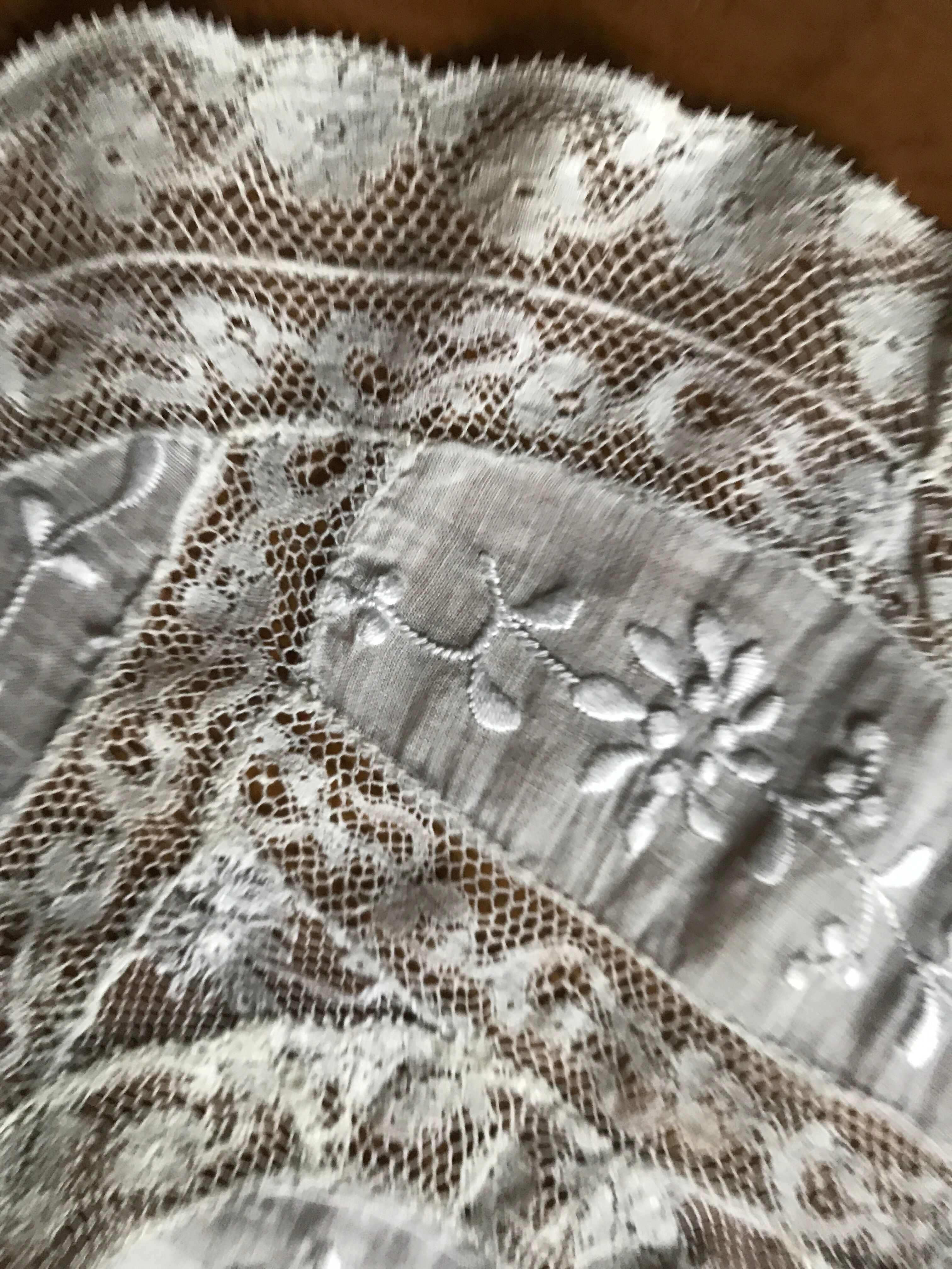 Embroidered lace cover