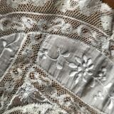 Embroidered lace cover