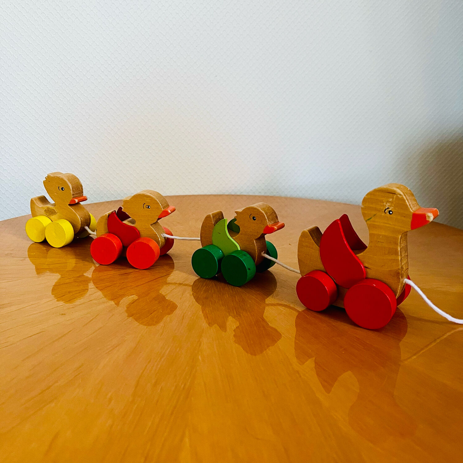 Old vintage wooden duck toy to pull