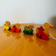 Old vintage wooden duck toy to pull