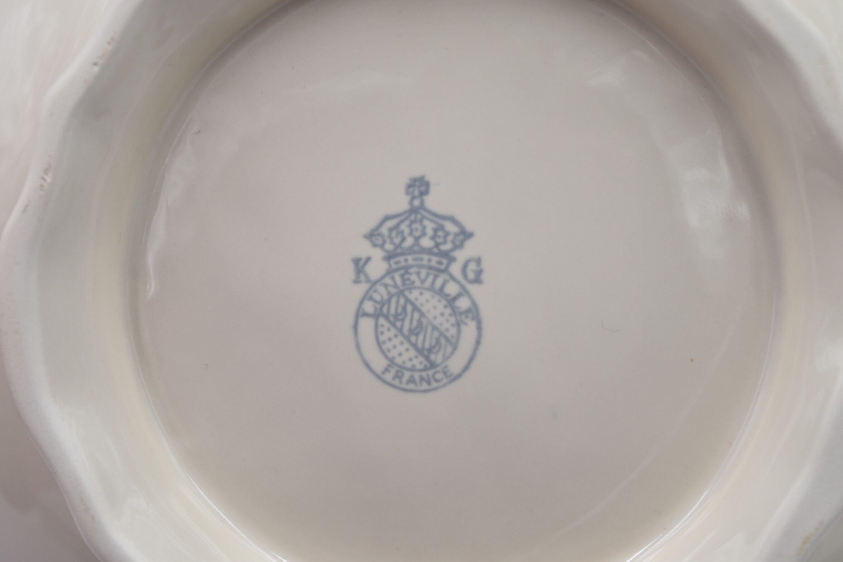 Salad bowl in off-white earthenware ivory Lunéville decoration in relief France