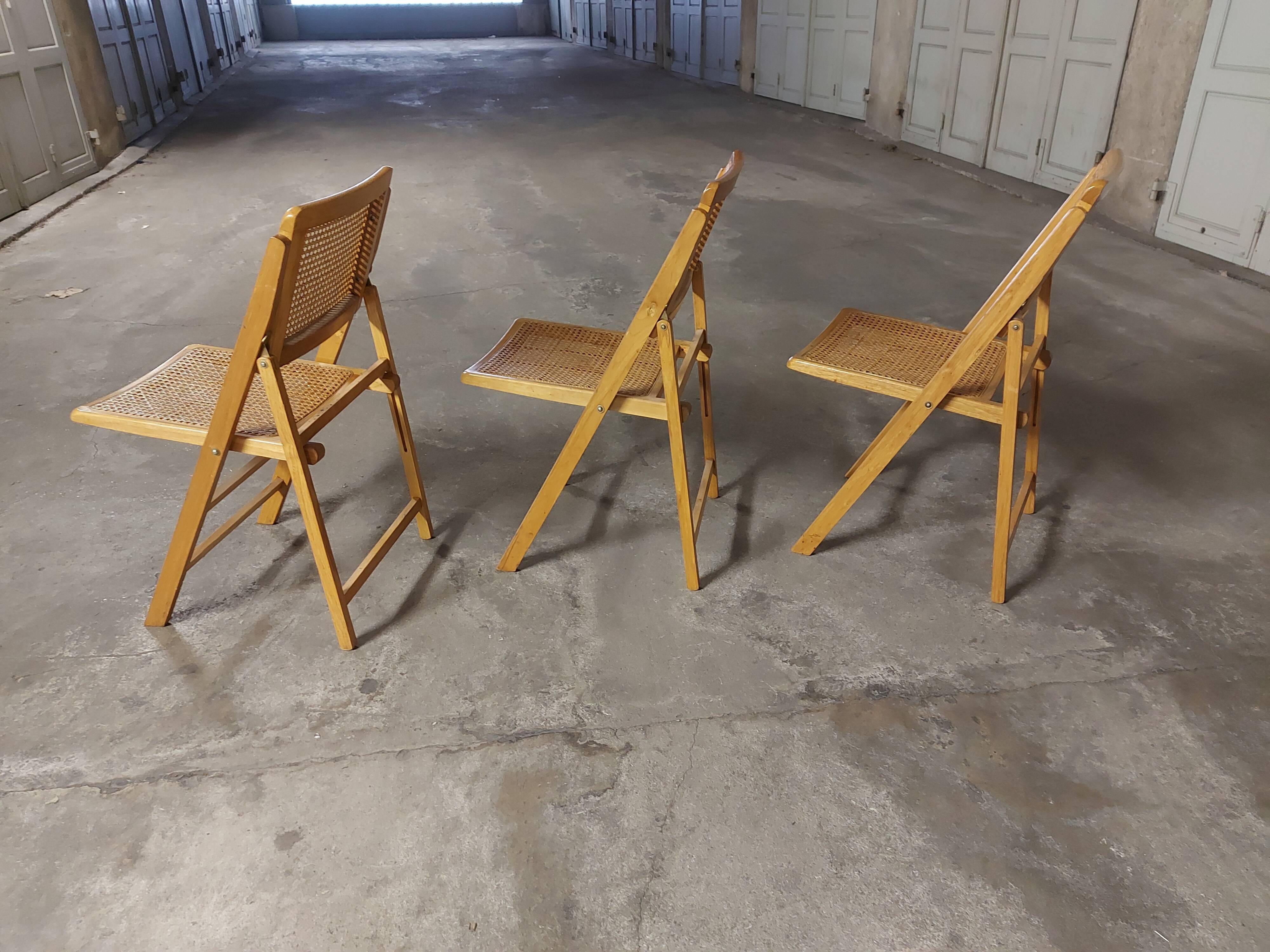 Set de 3 chaises  cannées  pliantes vintages 70