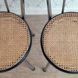Pair of chrome and cane bistro chairs from the 70s.