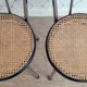 Pair of chrome and cane bistro chairs from the 70s.