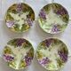 Lot of 4 Onnaing barbotine plates with grapevine design.