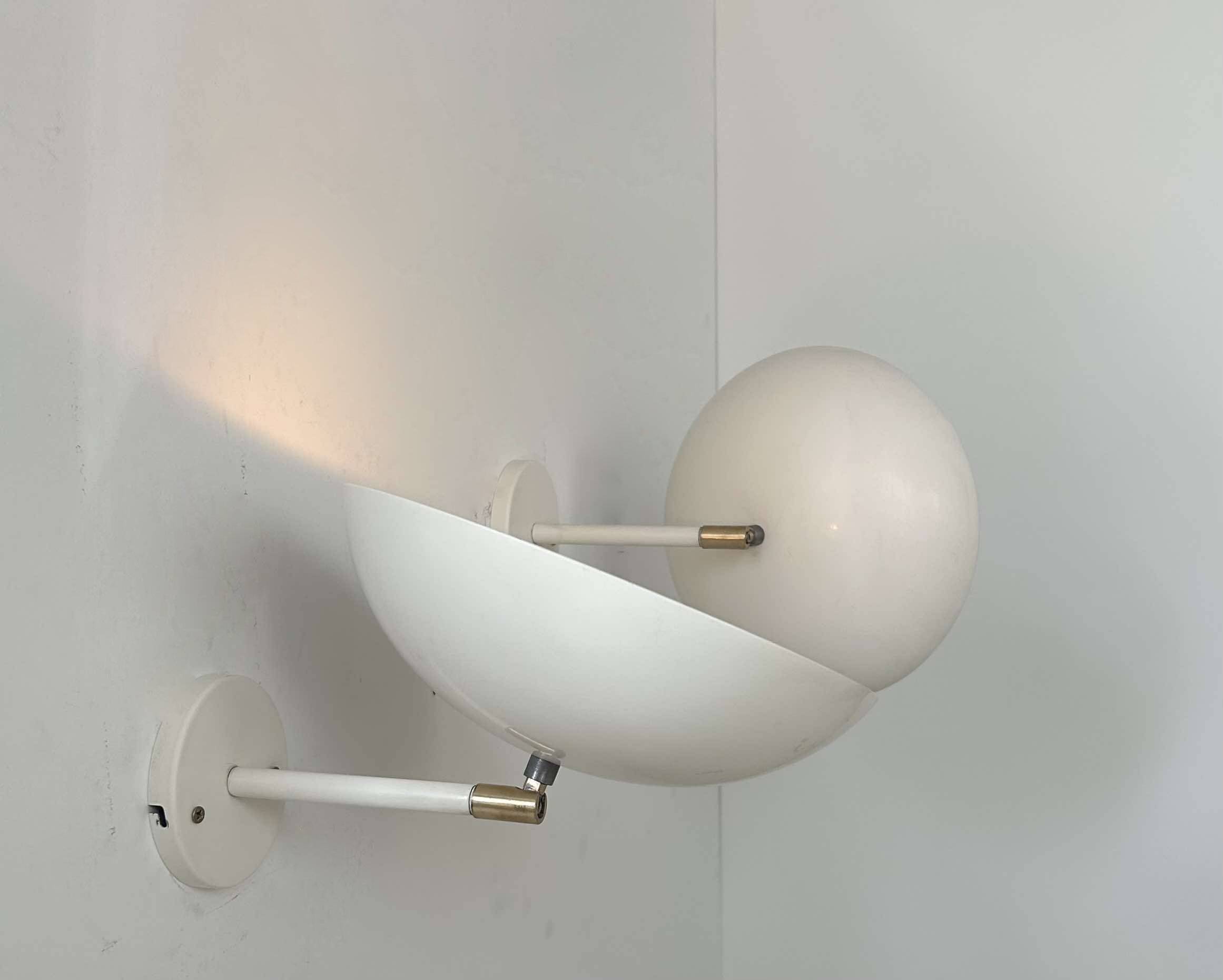 Pair of vintage adjustable wall lights, brass and white metal, France 1970