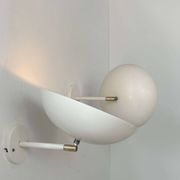 Pair of vintage adjustable wall lights, brass and white metal, France 1970