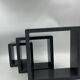 3 nesting shelves in grey lacquer.