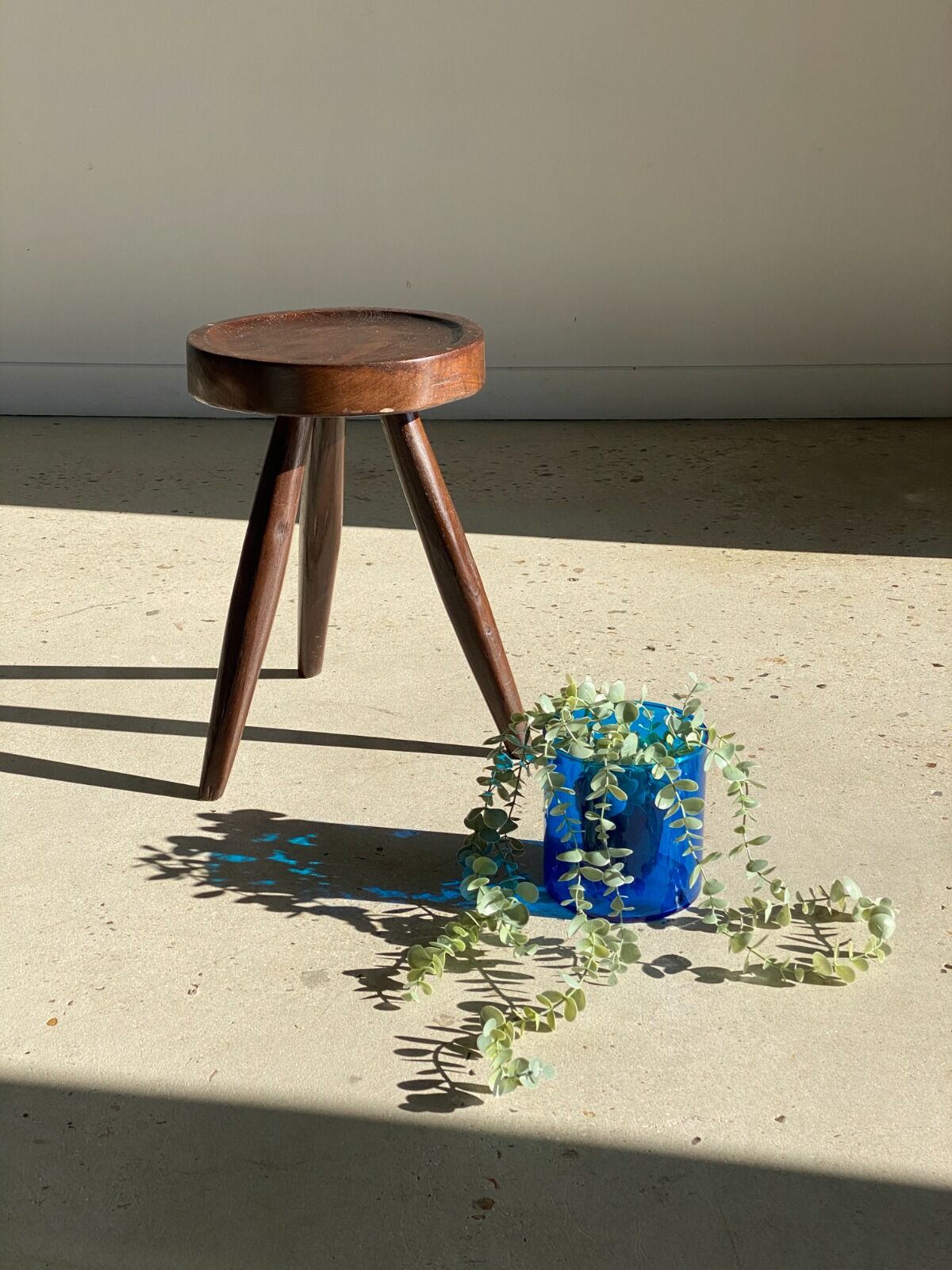 Brown solid wood stool seated circular dug