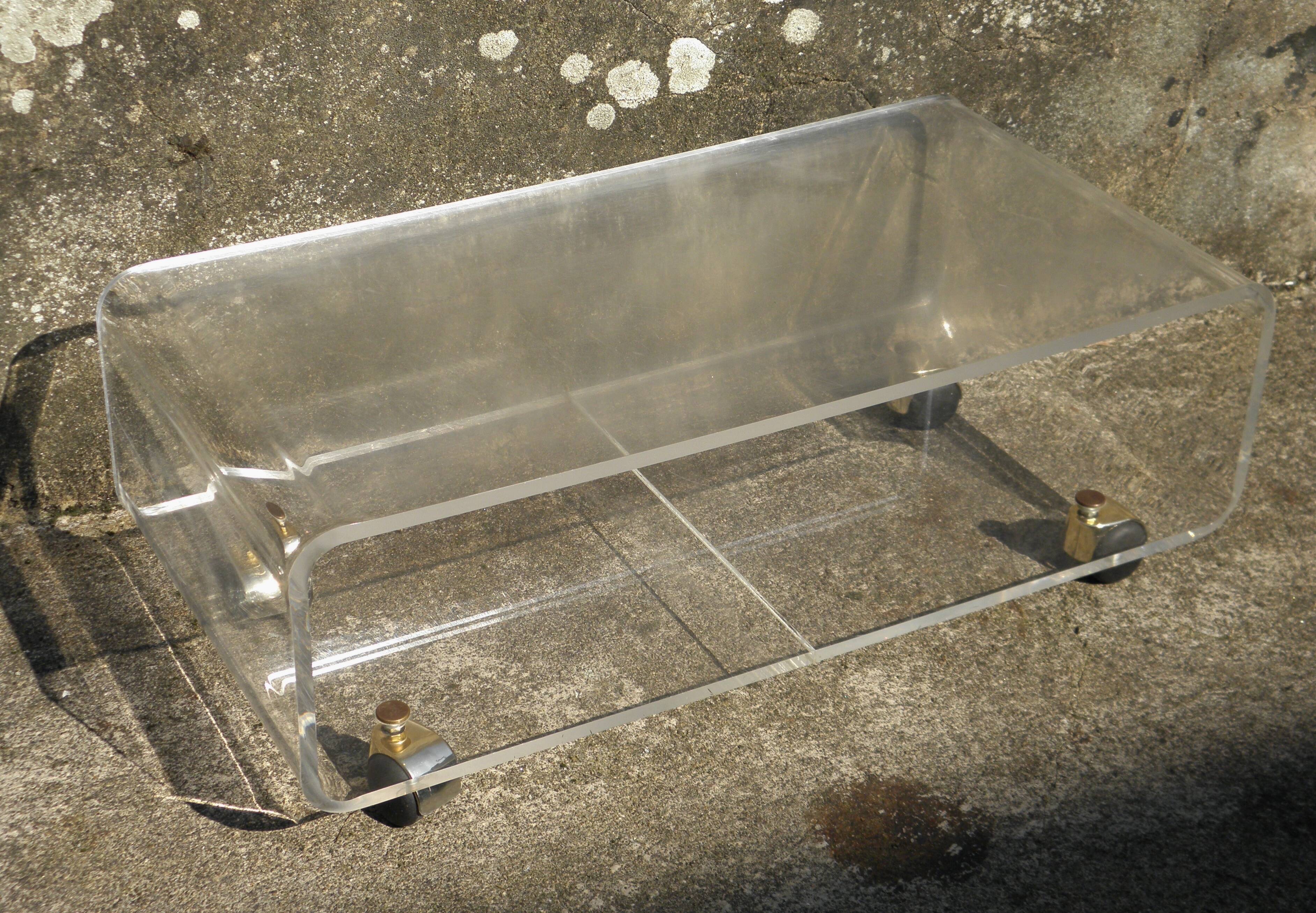 Plexiglass coffee table on wheels