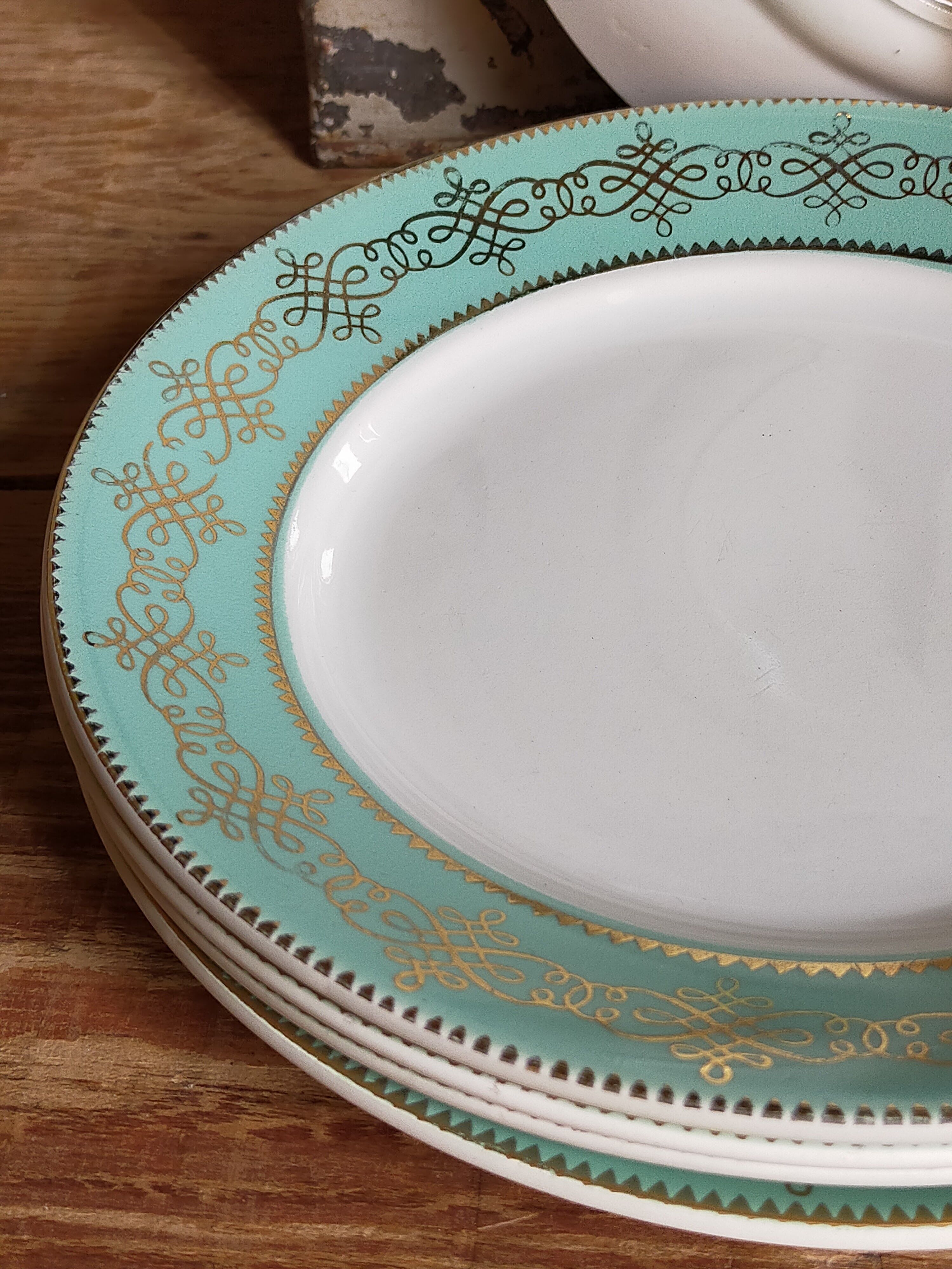 Six plates of vintage Badonviller earthenware with gold frieze