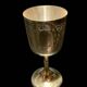 Set of six gold metal glasses