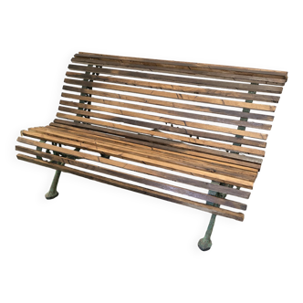 Old cast iron garden bench with oak slats