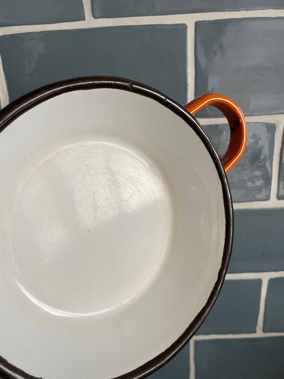 Orange enameled sheet egg dish