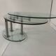 Oval designer coffee table in tempered glass