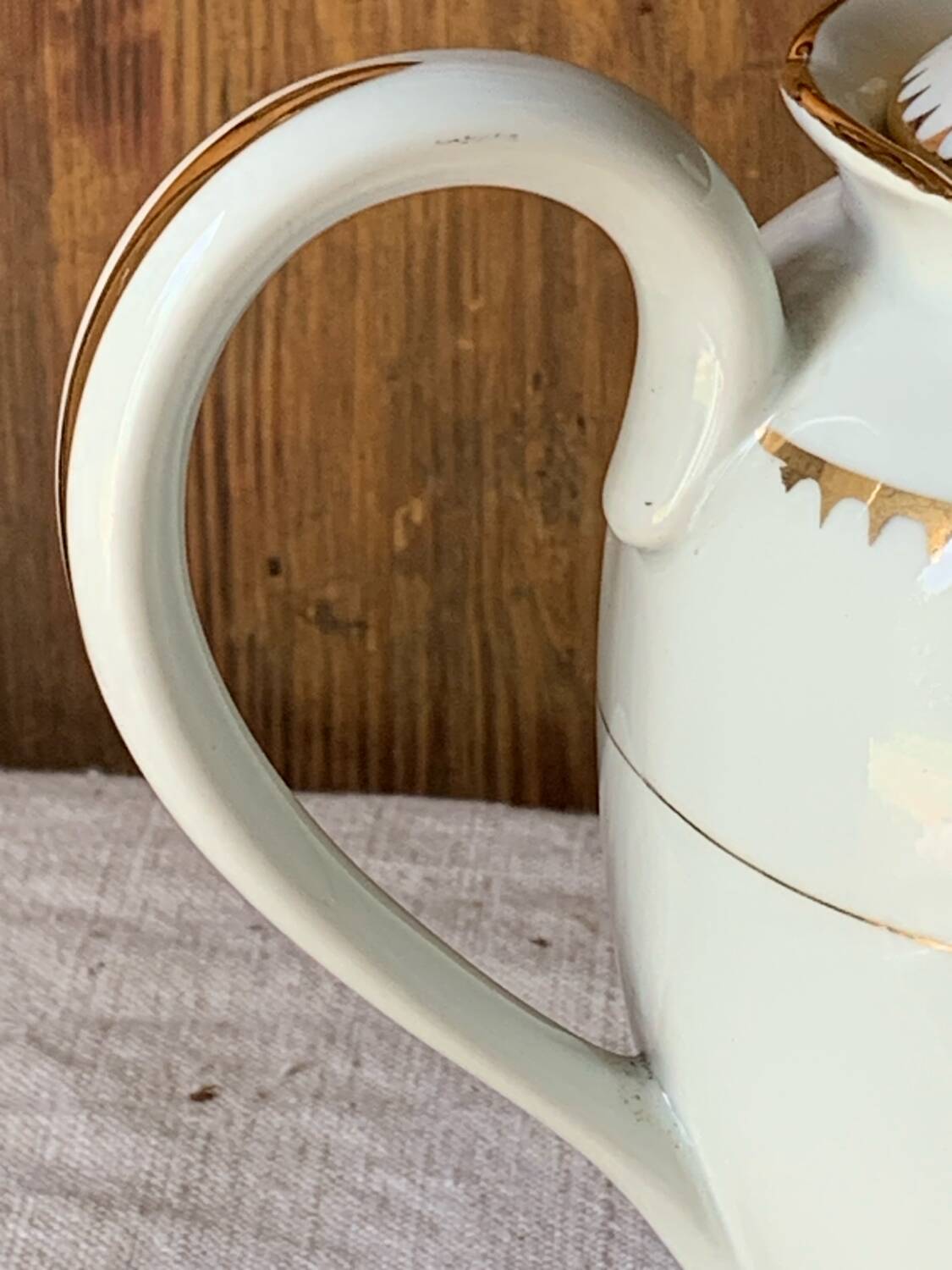 Antique porcelain jug with Limoges enamel