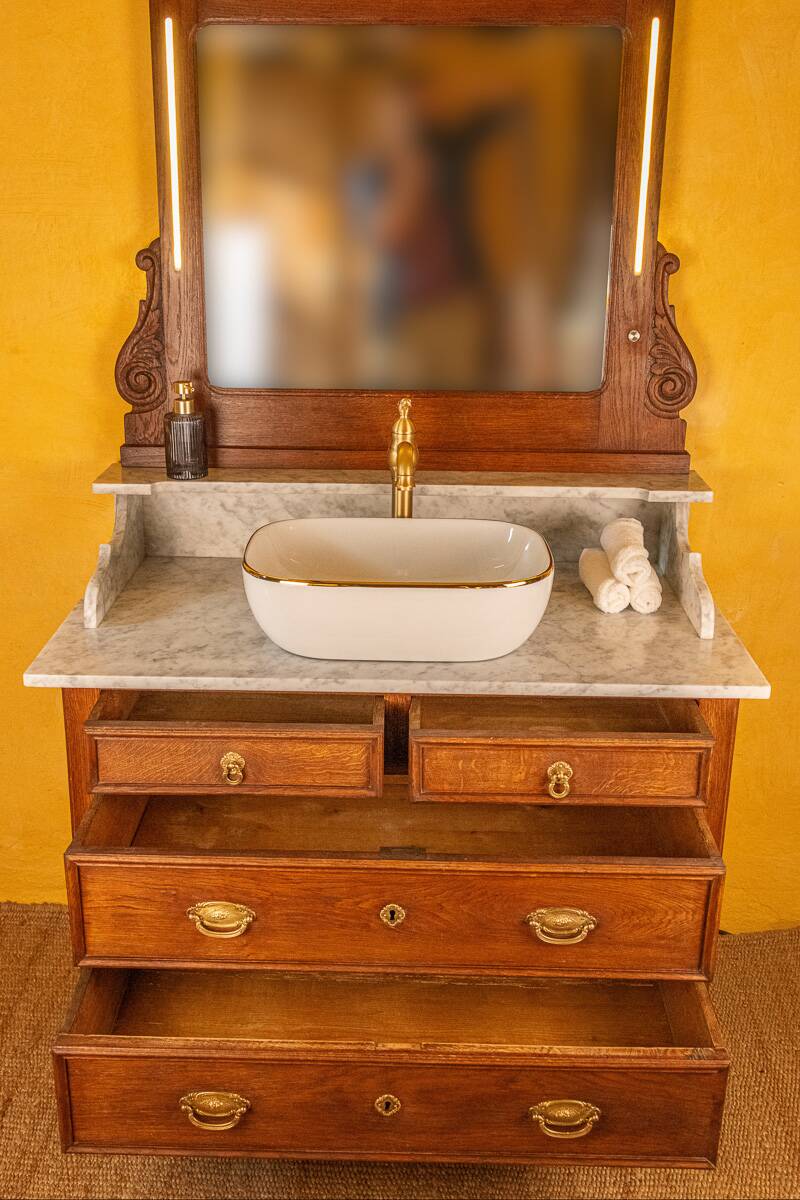 Vanity unit converted into a washbasin unit.