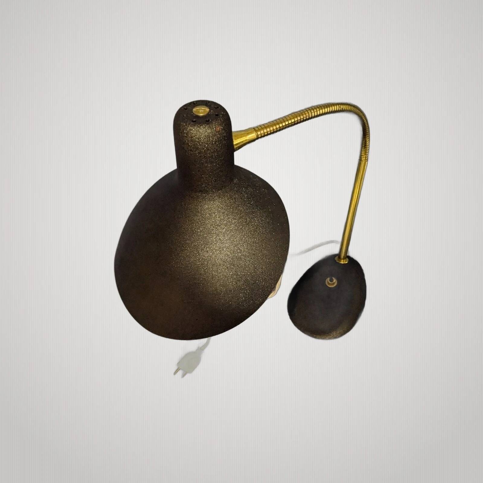 Large articulated desk lamp by Jean Boris Lacroix from the 1950s. Size.