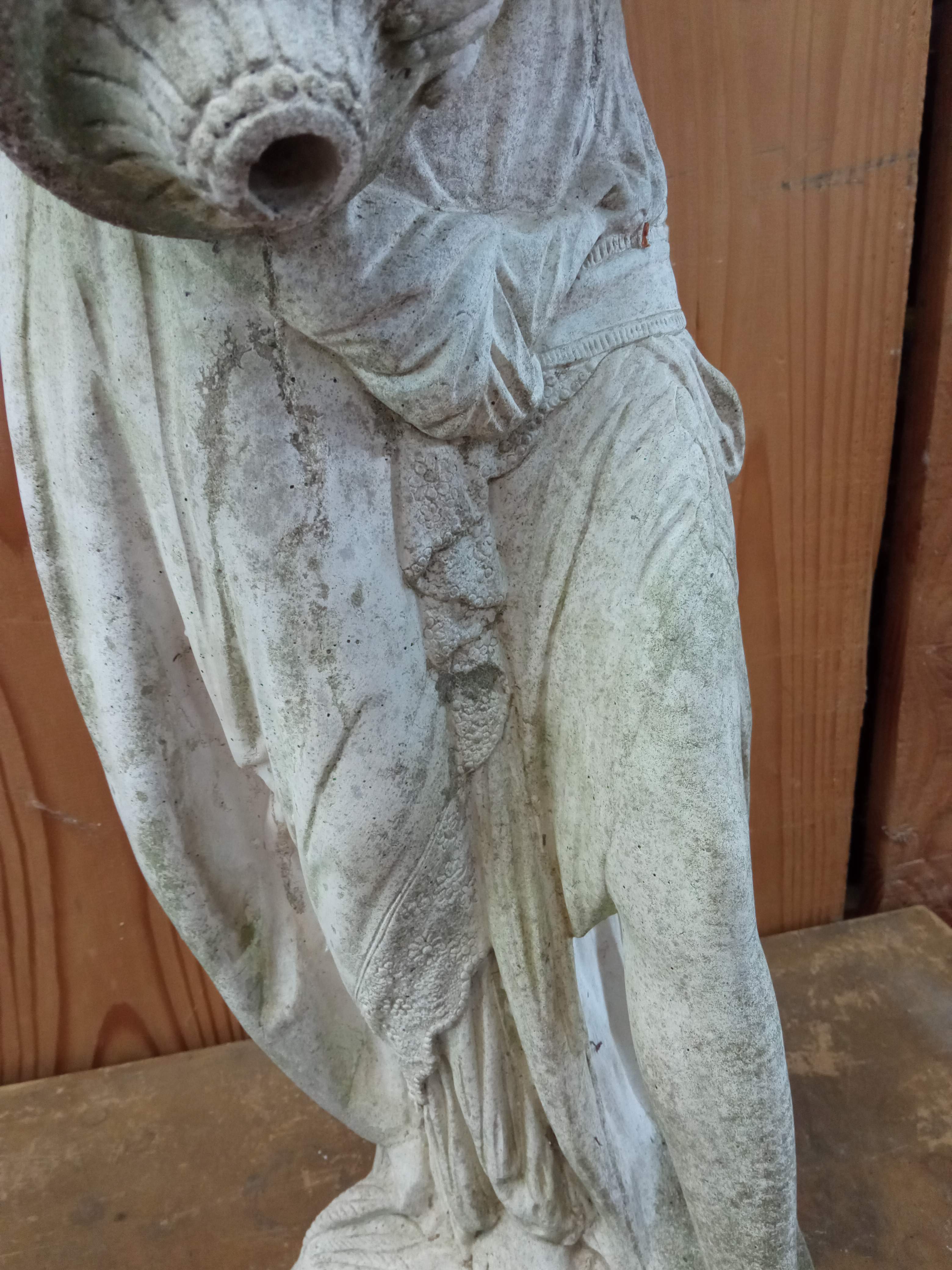 Reconstructed stone garden statue