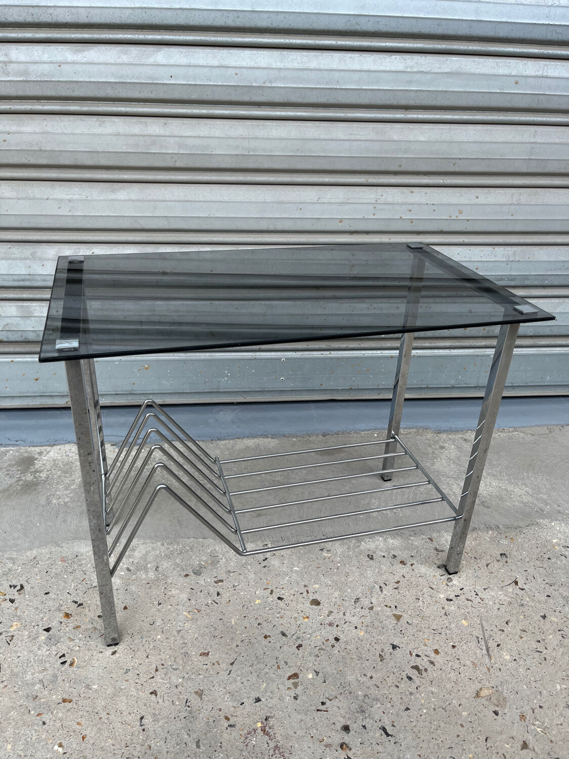 Coffee table, vinyl storage or metal and smoked glass occasional furniture