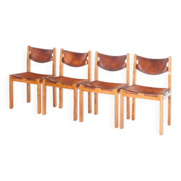 Set of four vintage chairs. Elm wood and leather. Regain House 70s.