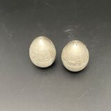 Egg-shaped metal salt and pepper shakers with Asian countryside motif