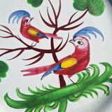 Eighteenth-century earthenware plate decorated with parrots.