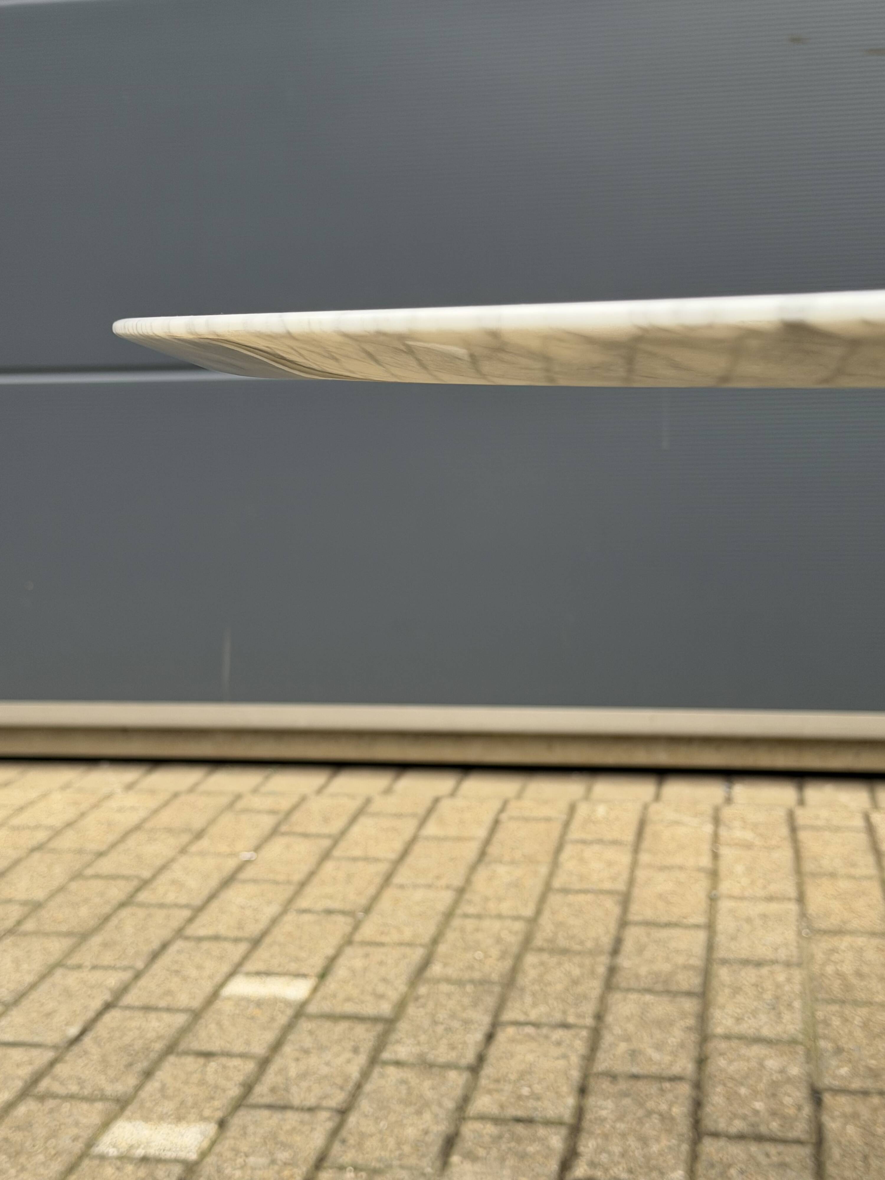 Original Knoll Tulip oval dining table (244cm) in Carrara marble.