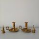 Set of 2 brass cellar rat candlesticks