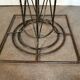 Wrought iron dining table with beveled round glass top, vintage 1980