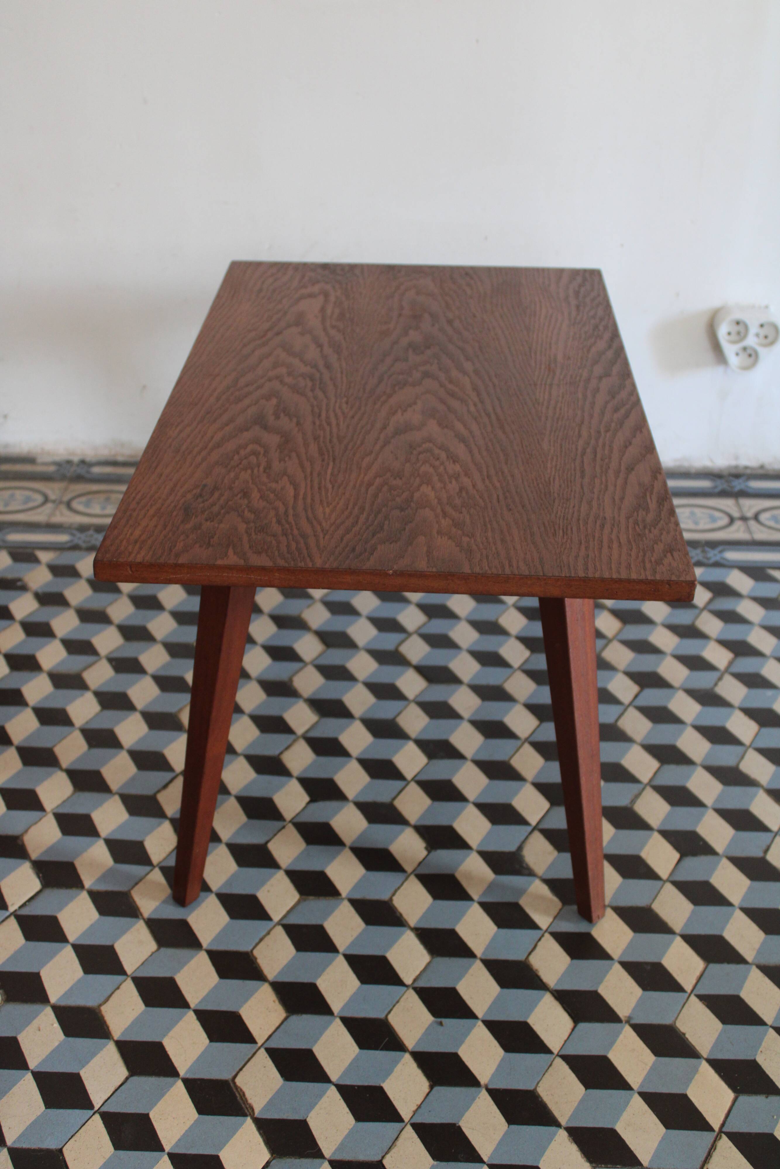 Teak coffee table with compass feet