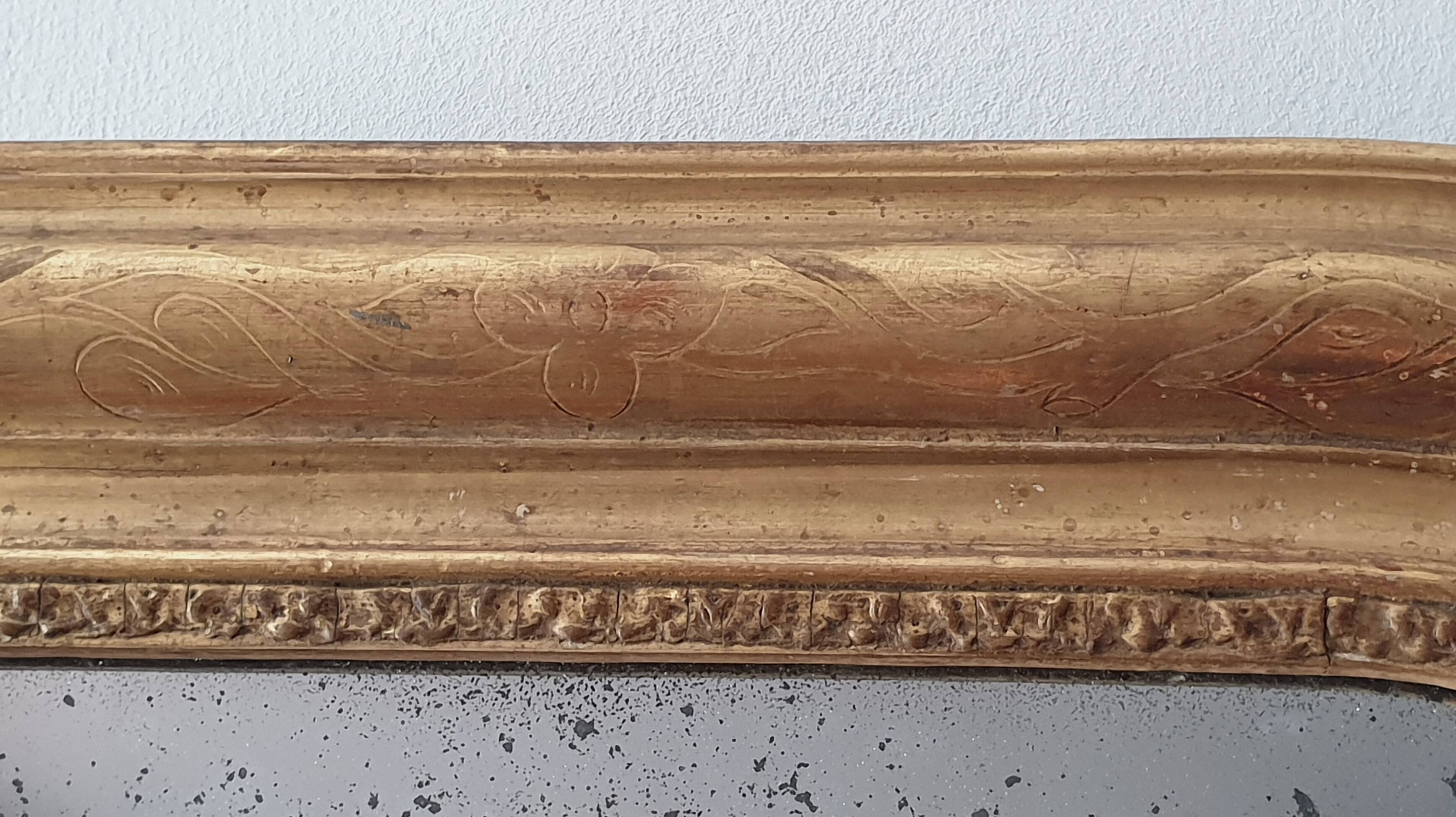 Old gilded mirror and old mercury glass - wall mirror with gold leaf