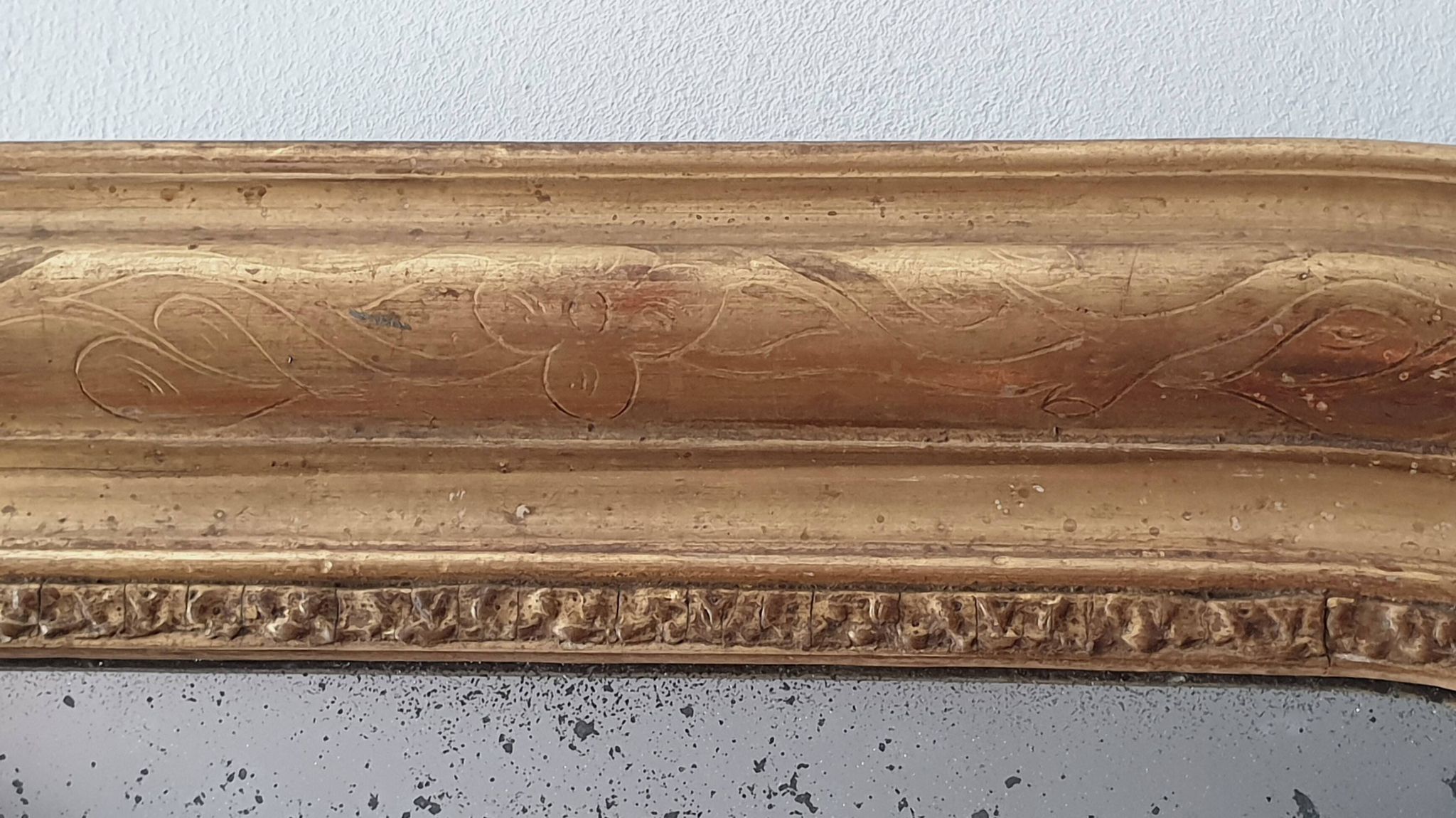Old gilded mirror and old mercury glass - wall mirror with gold leaf