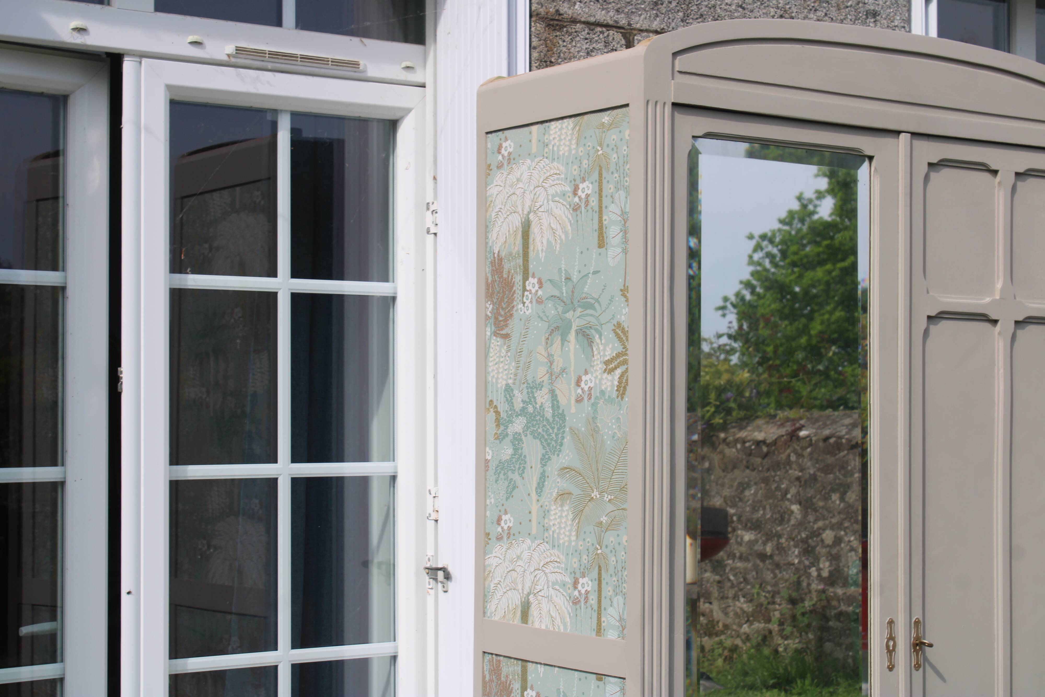 Vintage upholstered Parisian wardrobe