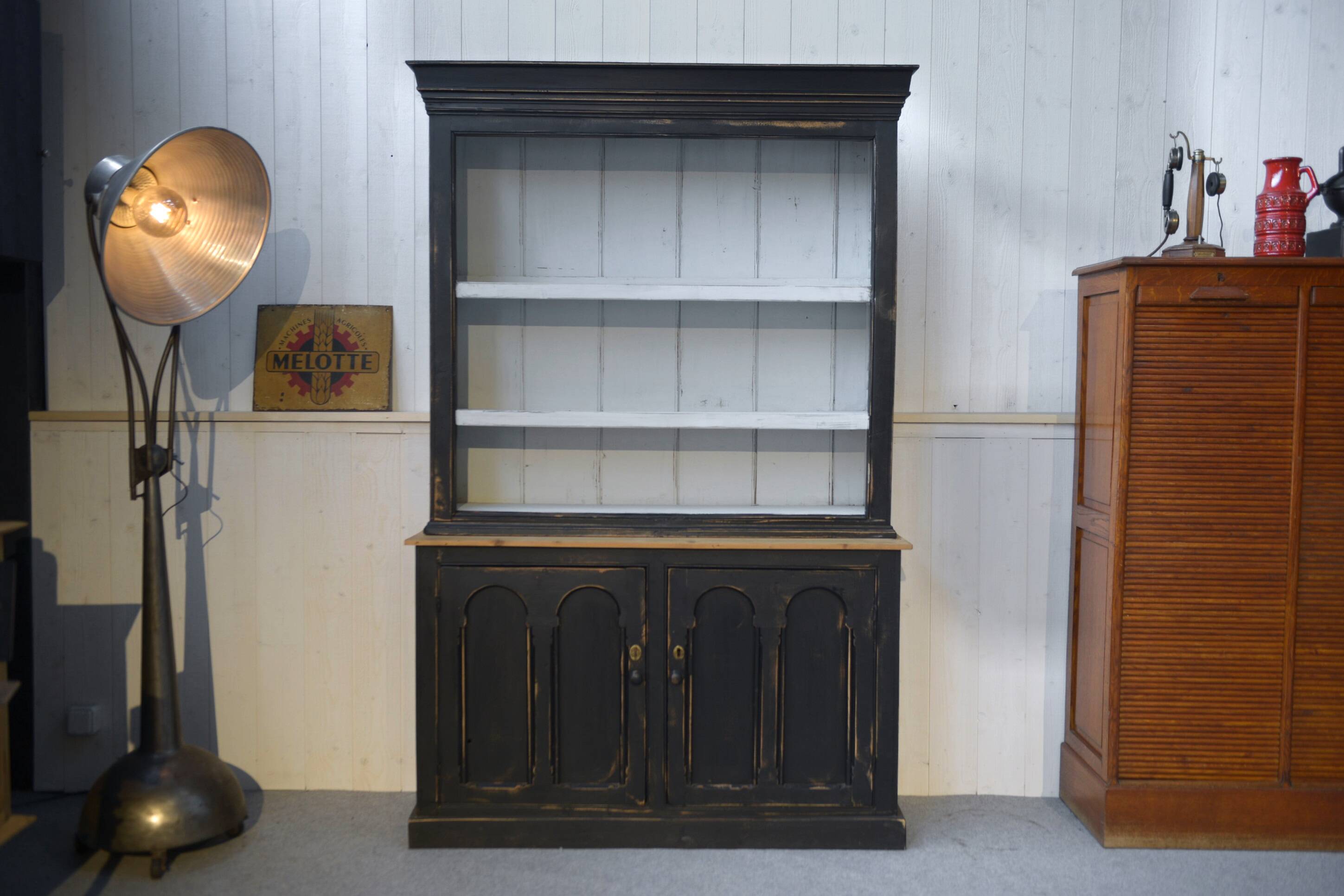 Two-body sideboard with black patina and white interior, 1950s