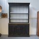 Black patina two-body buffet, white interior, 1950s.