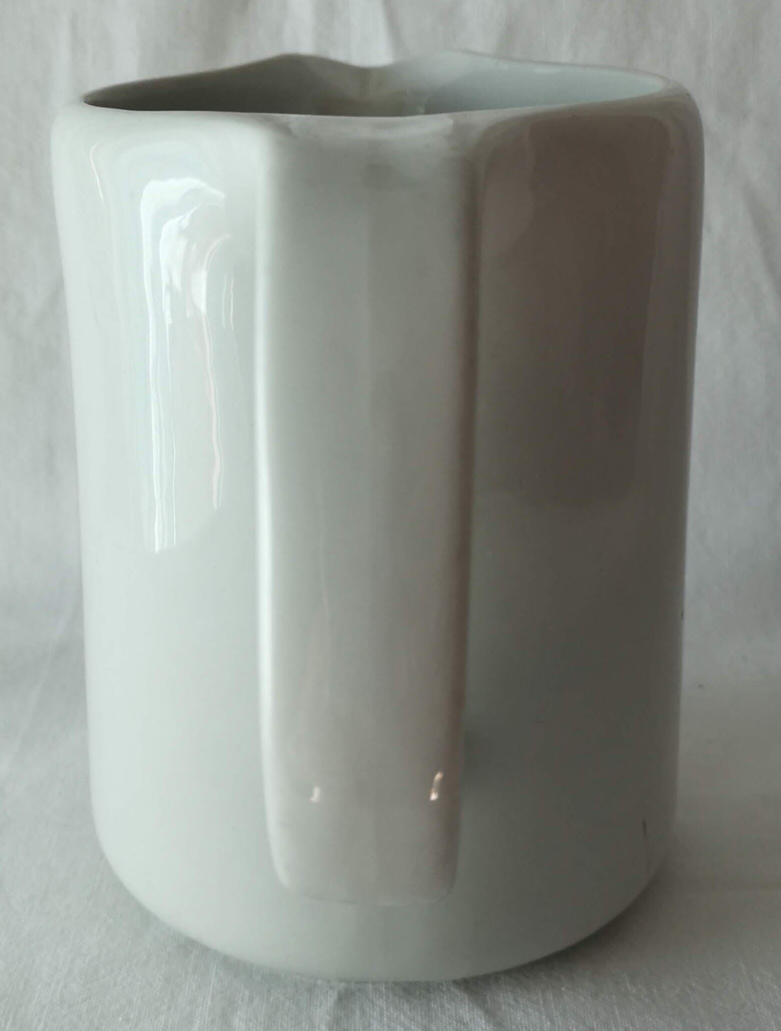 Limoges white earthenware milk pitcher