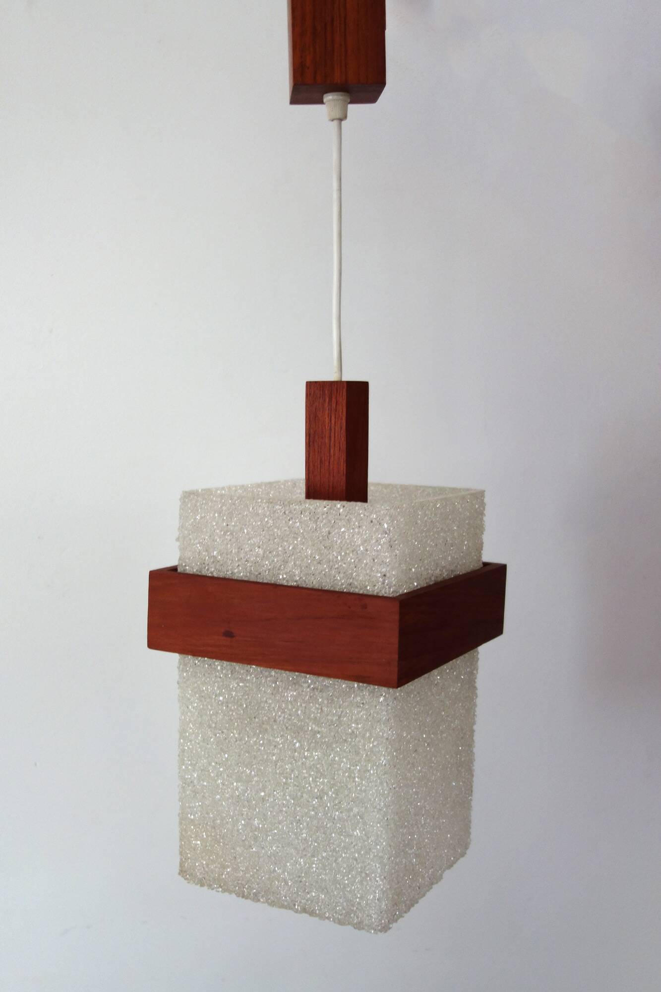 Scandinavian suspension in perspex and teak from the 60s/70s.