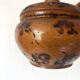 Wooden thumb candle holder