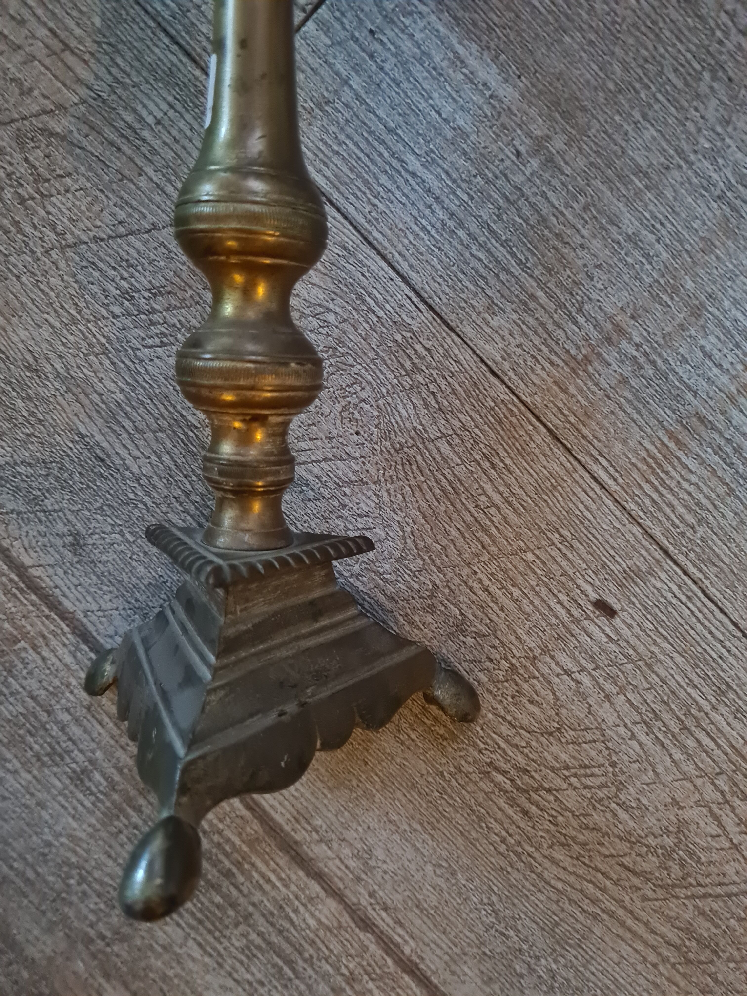 Pair of old brass candelabra