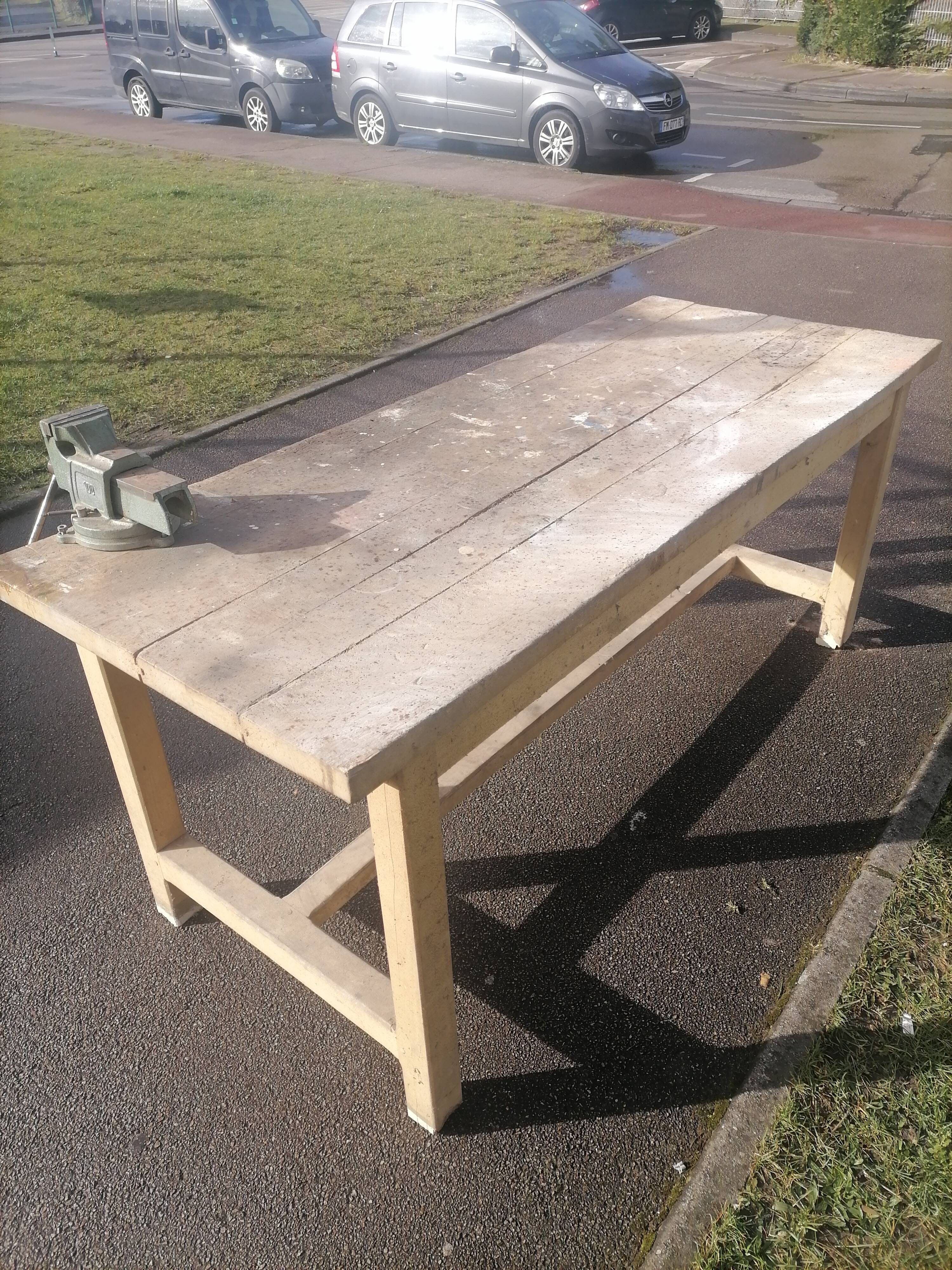 Old workbench workshop with wooden vices