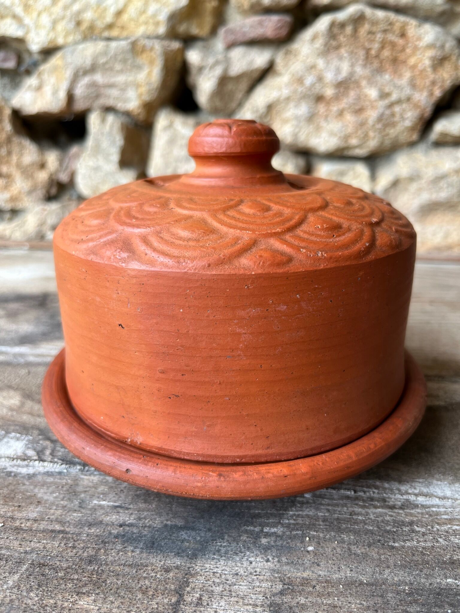 Cheese or butter bell in terracotta and its dish
