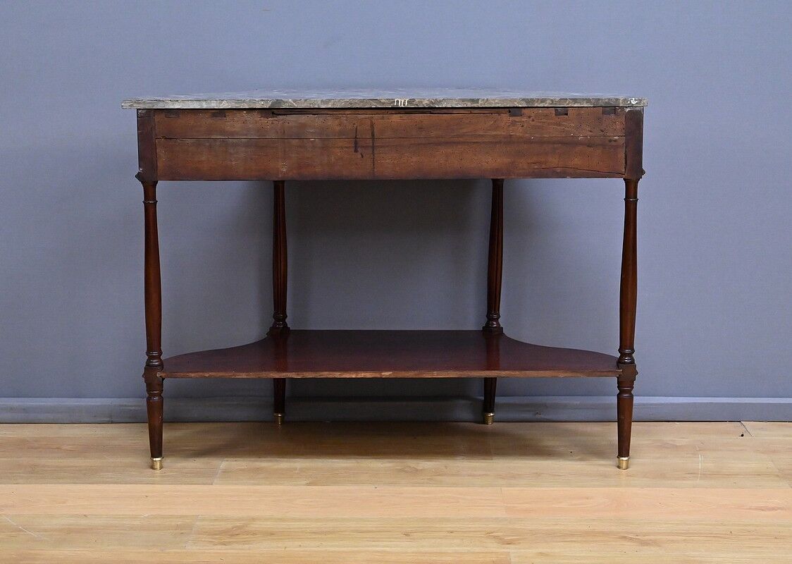 Console in mahogany and marble, Louis XVI period – late 18th century.