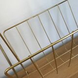 Gold metal magazine rack