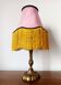 Art Nouveau lamp with fringed fabric shade