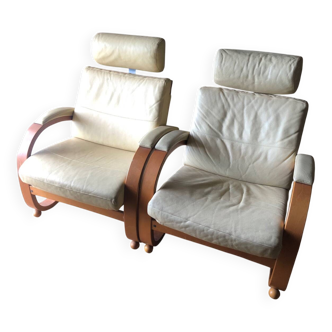 2 leather armchairs by Roche Bobois