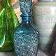 Vintage blue glass whiskey decanter
