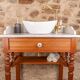 Antique washbasin cabinet in solid pitch pine with a white marble top.
