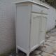 Small buffet, reimagined storage unit in beige.