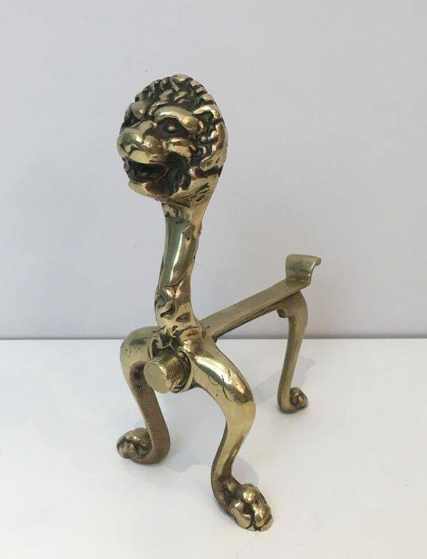 Pair of bronze andirons with lions